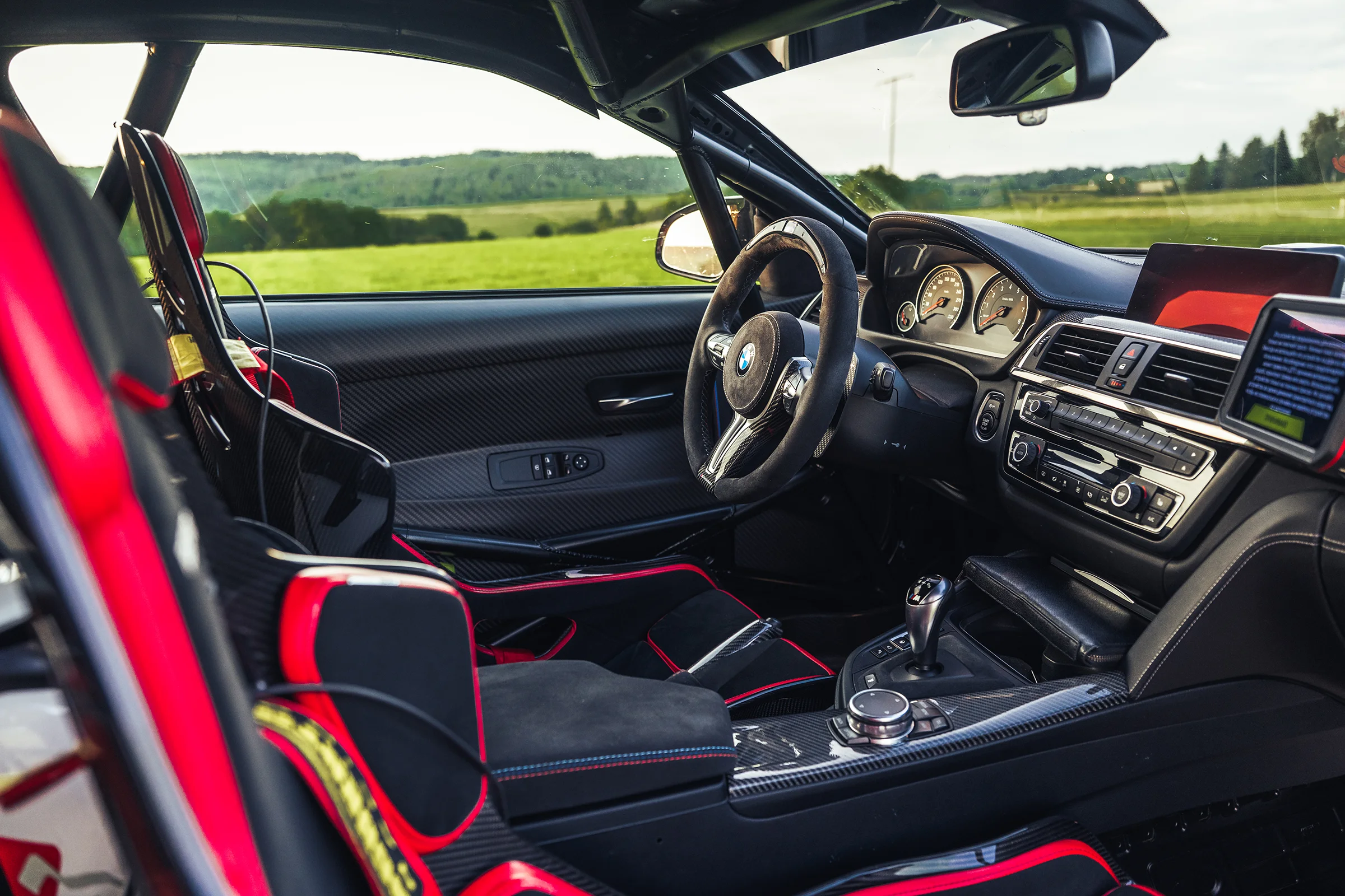 GTM 4.4 interior with racing seats and roll cage